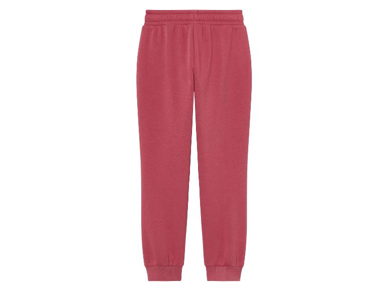 Un pantalon de survêtement rose avec une taille élastique.