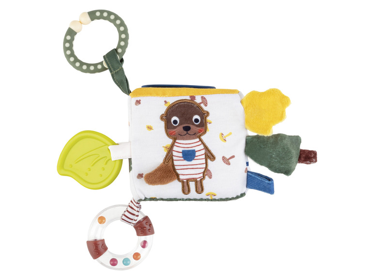 Un jouet pour bébé avec un écureuil, deux anneaux et un anneau de dentition en forme de feuille.