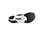 Semelle de chaussure de course noire et blanche avec inscription 'CARBON PLATE'.