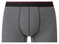 Boxers grises avec une bande noire et rouge.
