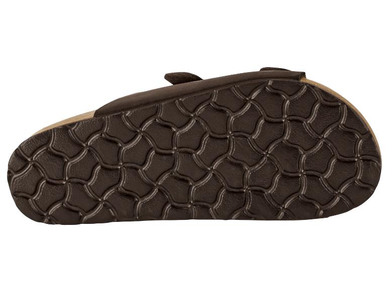 Semelle de sandale marron avec motif antidérapant, vue de dessous.