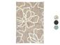 Tapis beige à motifs floraux, disponible en plusieurs couleurs.