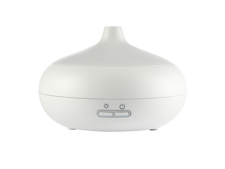 Un diffuseur d'arômes blanc avec une base ronde et une lumière LED intégrée.