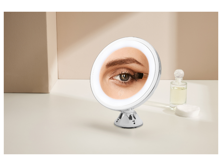 Miroir de maquillage avec éclairage LED et ventouse.