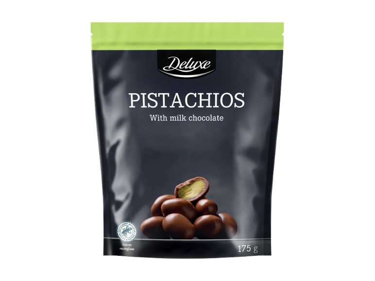 Pistaches au chocolat au lait, 175 g, dans un emballage sombre.
