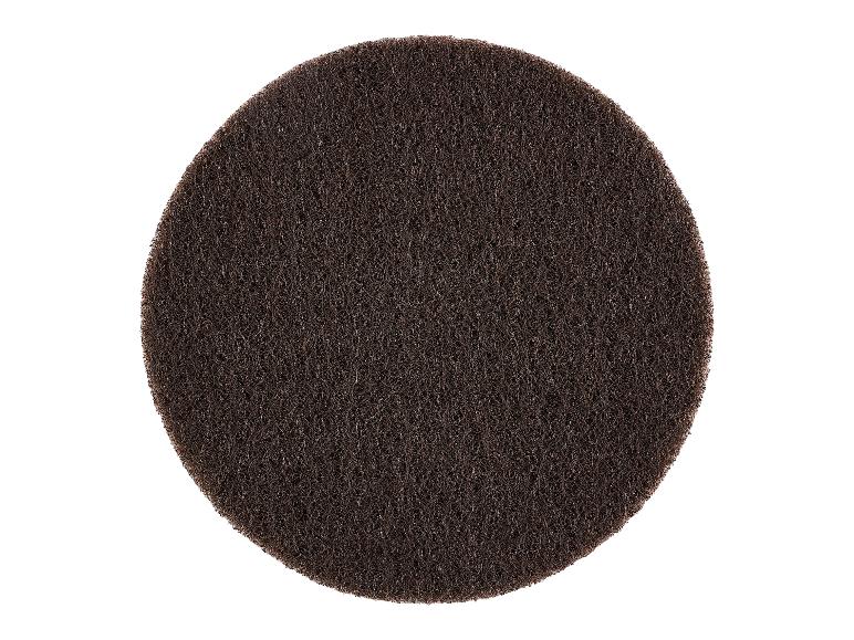 Un tampon de polissage rond de couleur marron.