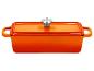 Cocotte en fonte orange avec couvercle et bouton argenté