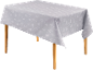 Nappe grise avec motif blanc de sapins et étoiles, étalée sur une table.