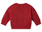Un sweat-shirt rouge à manches longues pour bébé.