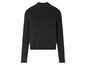 Un pull noir en tricot avec un motif en câble.