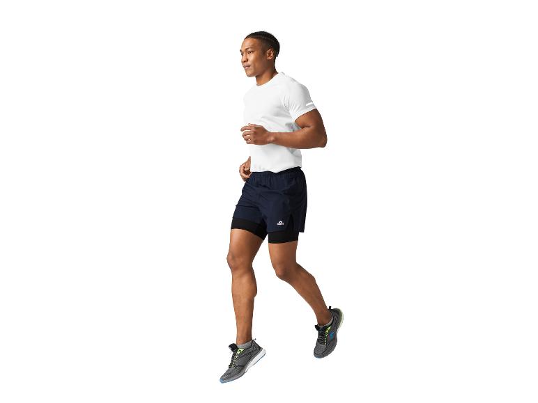 Homme courant en t-shirt et short Crivit.