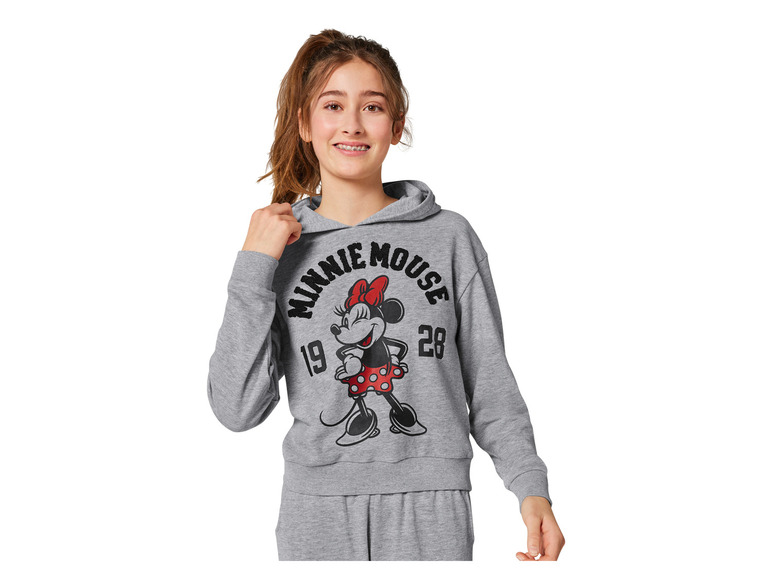 Un sweat-shirt gris avec un imprimé Minnie Mouse.