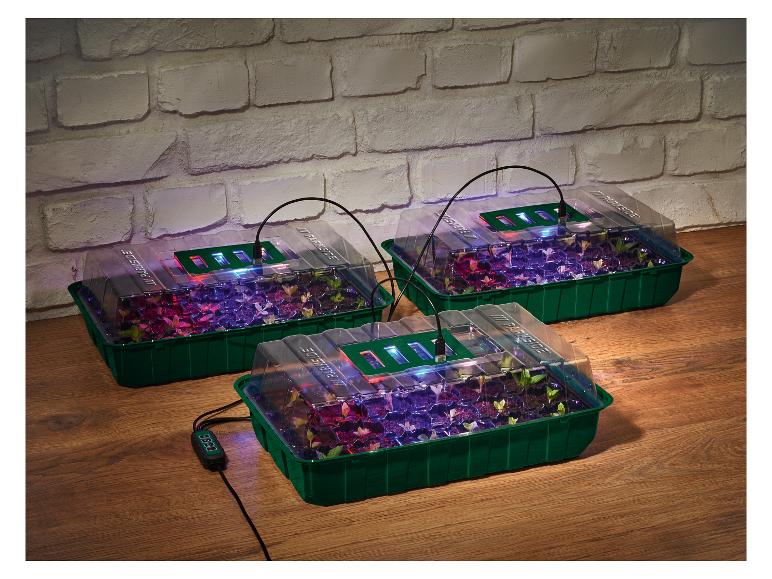 Trois mini-serres PARKISDE avec lumières de croissance LED et un contrôleur de température.