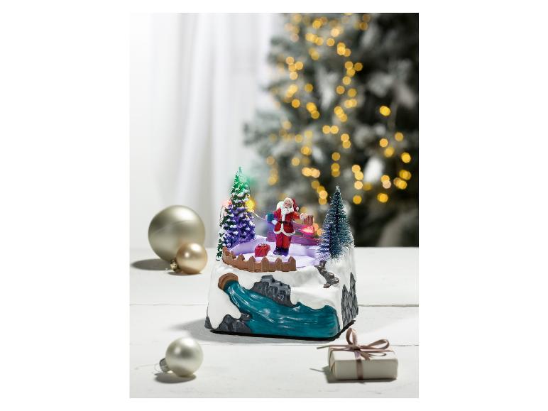 Décoration de Noël avec le Père Noël sur des patins à glace.