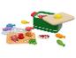 Jouets en bois sur le thème de la nourriture : casseroles, poissons, viande et légumes.