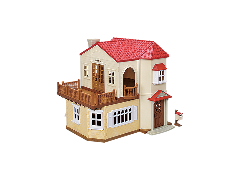 Maison de poupée jouet avec toit rouge, balcon et boîte aux lettres.