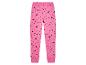 Pantalon de pyjama rose à motifs d'étoiles et de lunes.