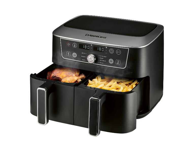 Friteuse à air double avec poulet rôti et frites, à commande numérique.