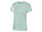 Un t-shirt Hummel vert clair pour femme.