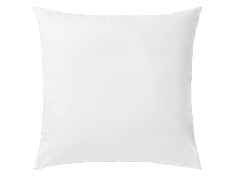 Un oreiller blanc avec un tissu lisse et uni.