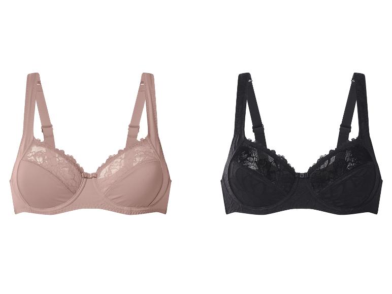 Deux soutiens-gorge pour femmes, un beige et un noir, avec des détails en dentelle.