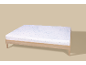 Lit avec drap-housse blanc à motif de flocons de neige