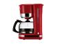 Cafetière rouge avec verseuse en verre et bouton d'alimentation lumineux.