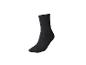 Une chaussette noire sur fond blanc