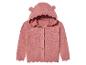 Un pull rose en tricot à capuche et oreilles pour bébés.