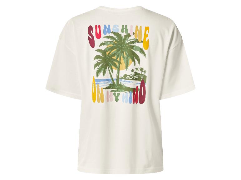 T-shirt crème avec imprimé coloré de palmiers et le texte 'SUNSHINE ON MY MIND'.