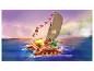 Bateau LEGO Moana's Wayfinder avec personnages sur un océan vibrant au coucher du soleil.
