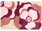 Tapis de bain floral avec motif floral abstrait dans des tons de rose, violet et beige.