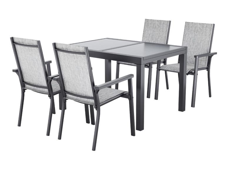 Ensemble de mobilier de jardin: table avec plateau gris foncé et quatre chaises avec revêtement gris.