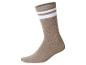 Une chaussette marron avec deux rayures blanches autour du haut.