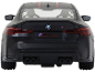 Arrière d'une voiture de sport miniature noire avec l'inscription M4 CSL.