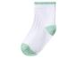 Chaussette blanche avec talon, pointe et bord-côte vert clair.