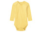 Un body bébé jaune à manches longues.