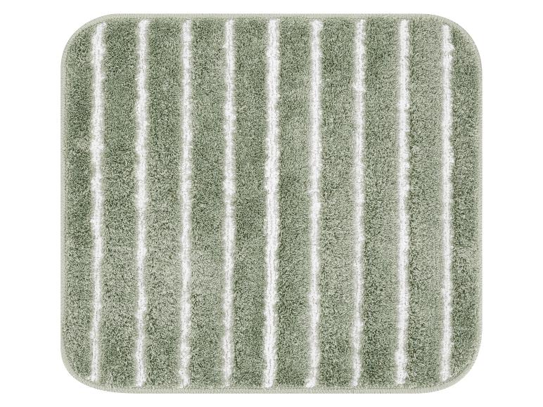 Tapis de bain rectangulaire vert à rayures blanches verticales et coins arrondis.