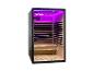 Sauna infrarouge avec intérieur en bois, porte vitrée et éclairage violet.