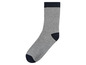 Chaussette grise avec des détails bleus.