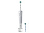 Une brosse à dents électrique Oral-B avec des têtes de brosse.