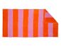 Serviette de plage rayée orange et rose.