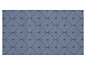 Un tapis bleu avec un motif géométrique blanc.