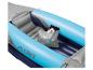 Kayak gonflable Crivit bleu et gris avec sac de rangement et tablette.