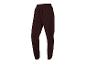 Pantalon de jogging brun foncé avec des bandes rouges.