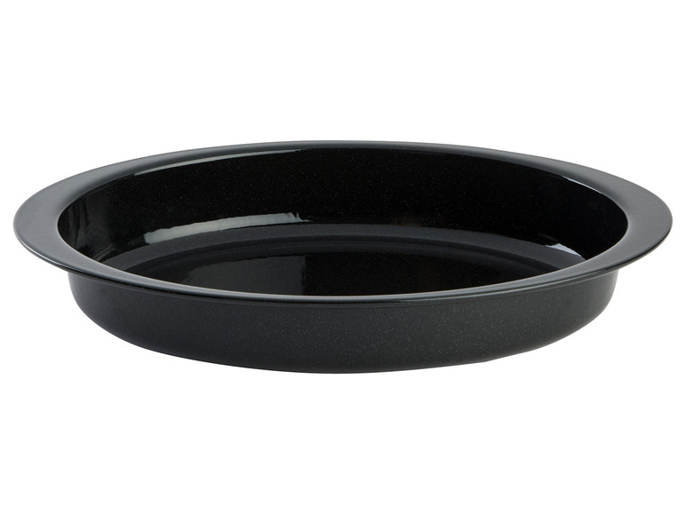 Un moule à pâtisserie rond noir.