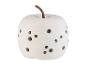 Décoration en forme de pomme en céramique blanche ajourée.