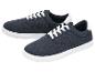 Une paire de baskets bleu marine avec des lacets et des semelles blanches.