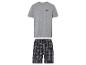 Un t-shirt gris et un pantalon de pyjama à carreaux bleus.