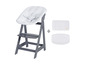 Une chaise haute grise avec un revêtement blanc matelassé et des coussins détachés.